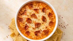 Finished cottage cheese pizza bowl topped with melted mozzarella, marinara, and pepperoni