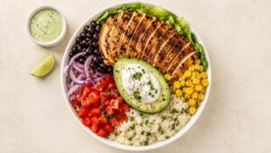 Grilled Chicken Burrito Bowl Grilled chicken burrito bowl with rice, beans, corn, and avocado