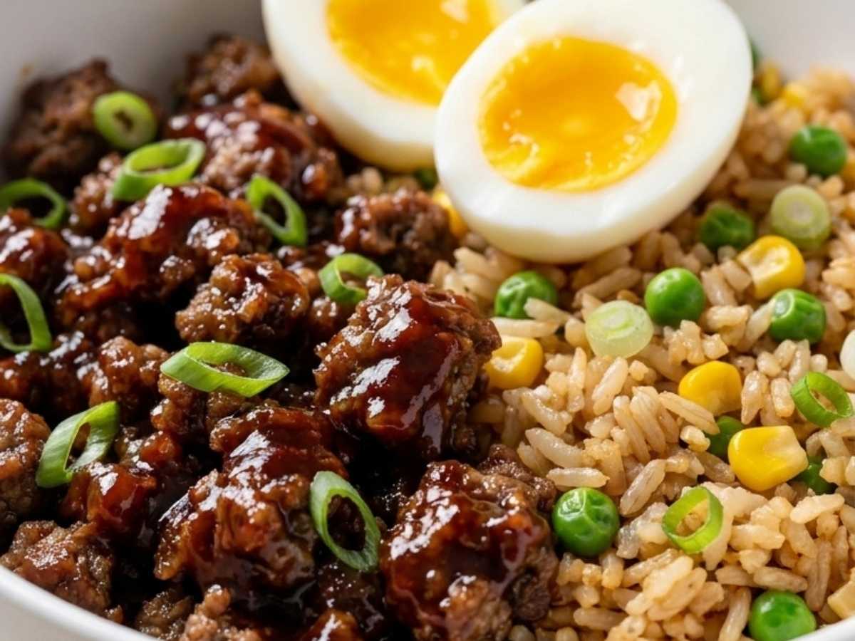 Close up of gochujang beef and jammy egg on a BBQ beef rice bowl