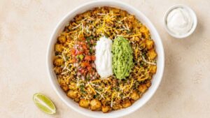 Loaded Potato Taco Bowl Loaded potato taco bowl topped with seasoned beef, cheese, pico de gallo, guacamole, and sour cream